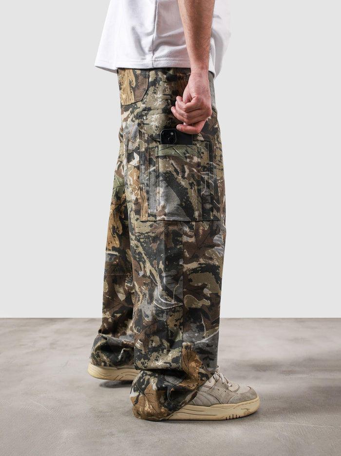 Tactical camo cargo pants female model back view camo streetwear Pakistan – GROOVY