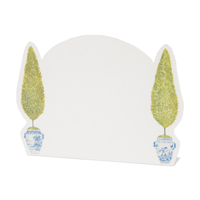 A white Hester & Cook Topiary place card with two potted trees on it.