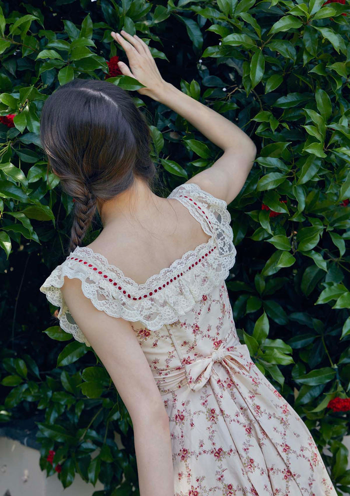 Back view of Lacemade "Red Garnet" dress - romantic lace ruffle sleeves and bow tie detail