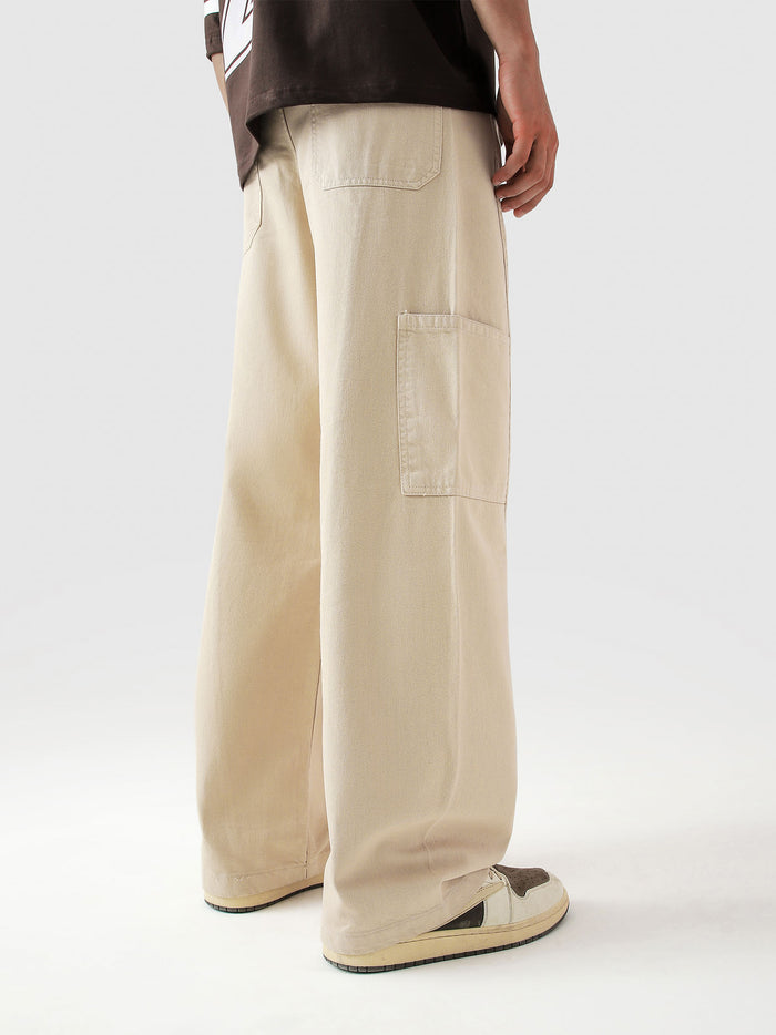 Cream Utility V1 cargos male model back view Pakistan – GROOVY