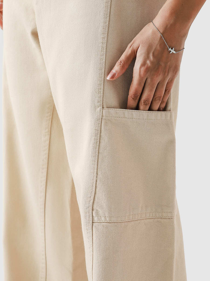 Cream Utility V1 cargos couple lifestyle shot Pakistan – GROOVY