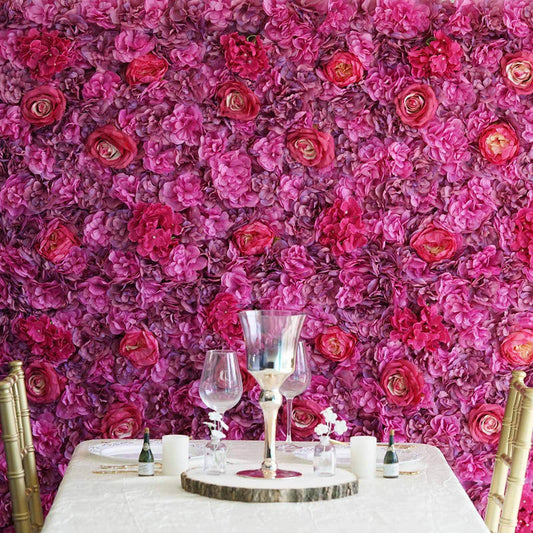 Elegant table setting with pink floral backdrop, perfect for events and celebrations.