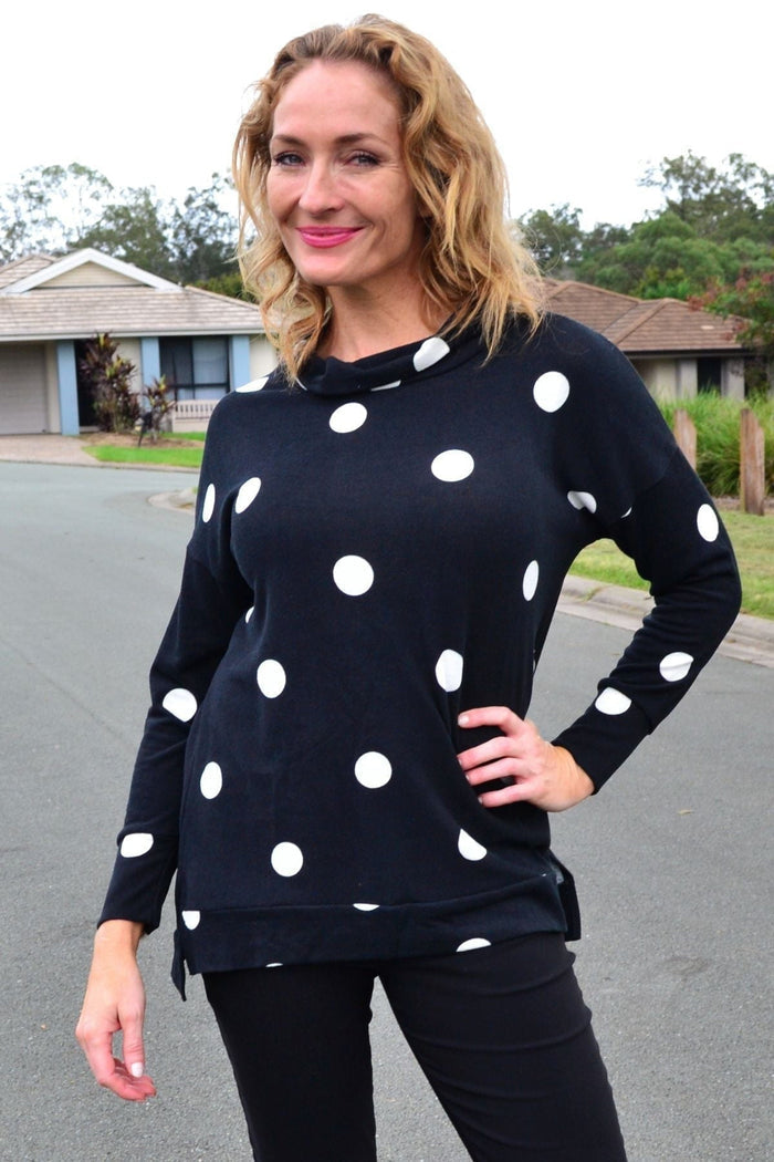 White Wishstone Spot Long Sleeve Fleece Tunic Top with a cozy, relaxed fit and subtle dotted pattern.