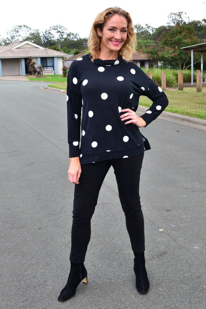 White wishstone long sleeve fleece tunic top with black spot pattern, cozy and casual for everyday wear.