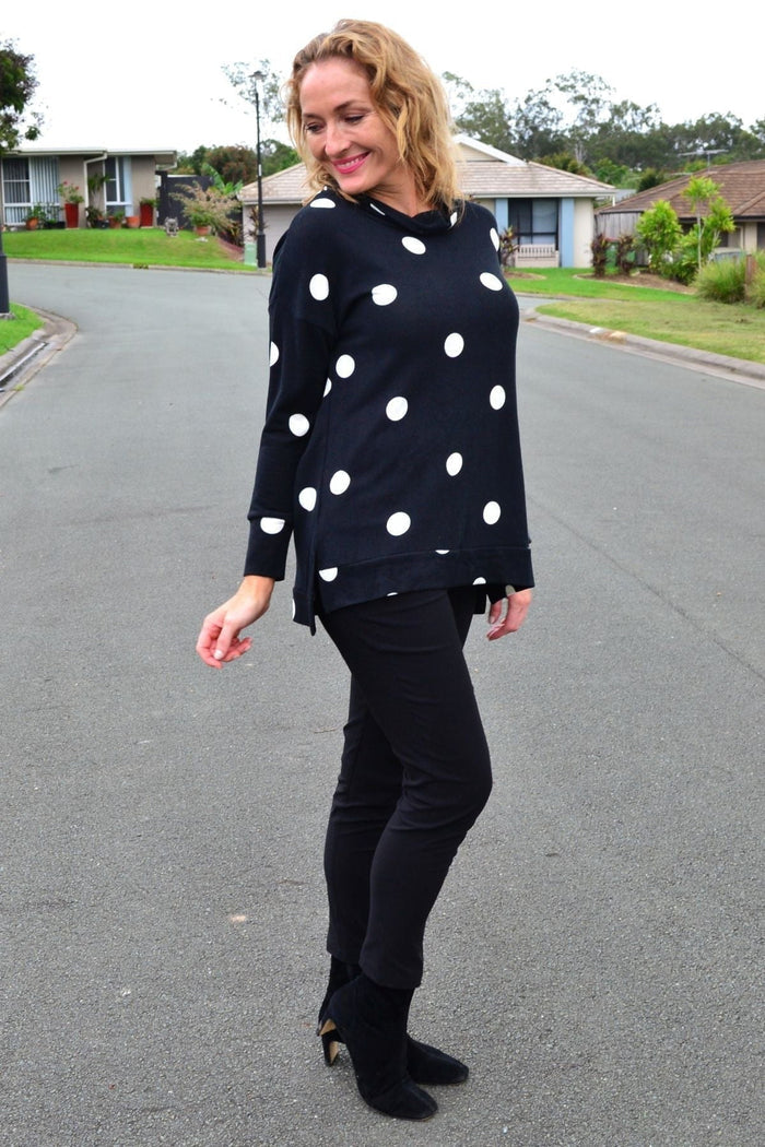 White Wishstone Spot Long Sleeve Fleece Tunic Top with cozy fabric and relaxed fit, shown on a mannequin.