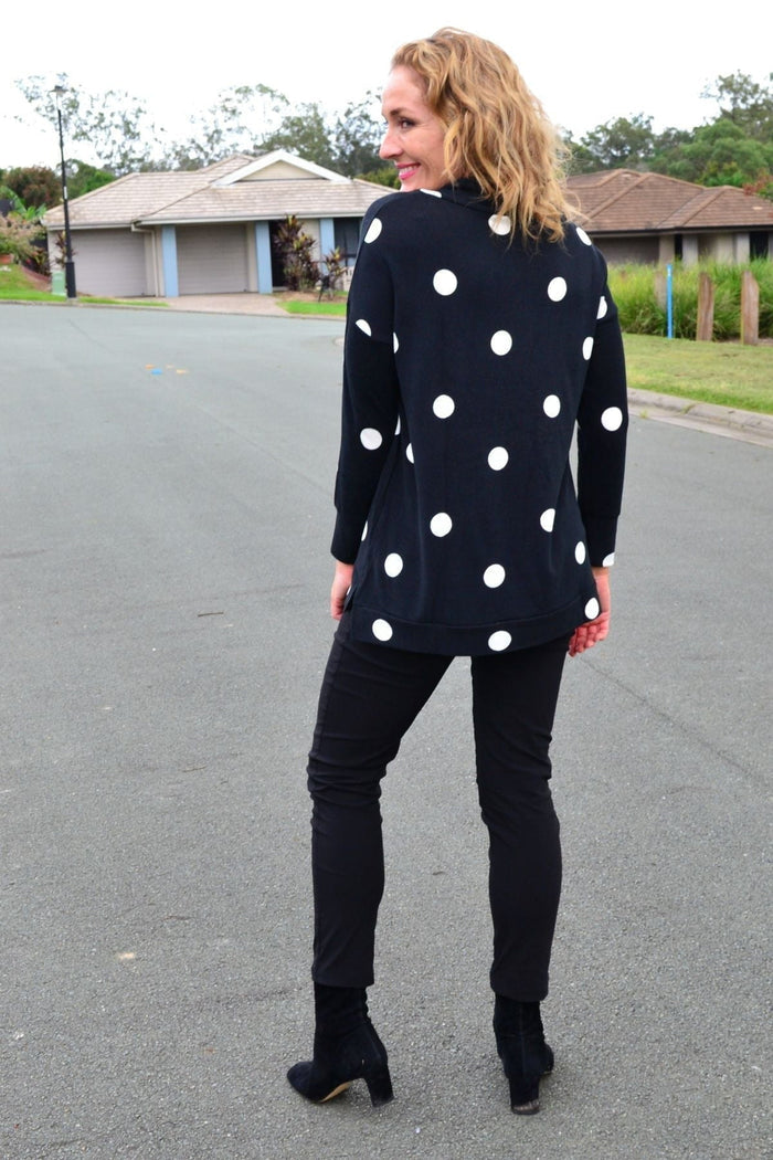 White Spot Long Sleeve Fleece Tunic Top by Wishstone, showing the cozy fleece fabric and relaxed fit of the stylish tunic.