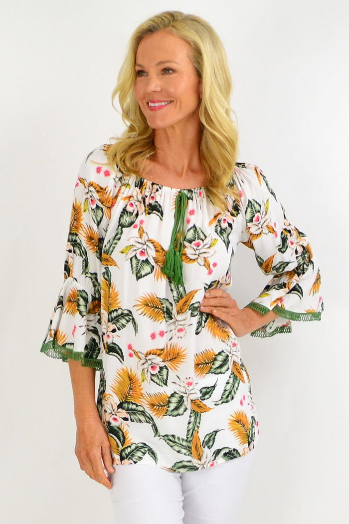 White tropical tassel off-shoulder tunic top with boho floral print, rayon fabric, by Missy Q.