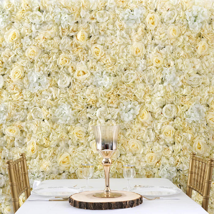 Elegant table setting with gold accents against a floral backdrop.